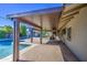 View from covered patio of backyard pool and recreation house at 5038 N 20Th Ave, Phoenix, AZ 85015