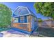 Charming blue recreation house featuring a cozy front porch at 5038 N 20Th Ave, Phoenix, AZ 85015