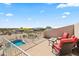 Relax on this private patio with comfortable seating and panoramic neighborhood views at 5221 N Tuthill Rd, Litchfield Park, AZ 85340