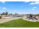 Inviting in-ground pool, lounge area and manicured lawn make this an entertainer's dream at 5221 N Tuthill Rd, Litchfield Park, AZ 85340