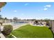 In-ground pool offers the perfect spot to relax and enjoy the outdoors at 5221 N Tuthill Rd, Litchfield Park, AZ 85340