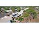 An aerial view of a neighborhood showcasing mature landscaping and homes with solar panels at 5353 W Dublin Ct, Chandler, AZ 85226