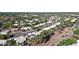 A community view with well-maintained landscaping, lush greenery, and eco-friendly solar panels lining the roofs at 5353 W Dublin Ct, Chandler, AZ 85226