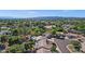 An elevated shot highlights single-Gathering homes in a green, lush community with swimming pools and desert-friendly plants at 5353 W Dublin Ct, Chandler, AZ 85226