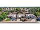 Aerial view of three single-Gathering homes showcasing well-maintained landscaping, tile roofs, and a desirable neighborhood at 5353 W Dublin Ct, Chandler, AZ 85226