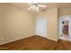 Bedroom with ceiling fan, hardwood floors, and closet access at 5353 W Dublin Ct, Chandler, AZ 85226