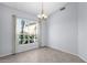 Well-lit dining area with tile floor and a large window at 5353 W Dublin Ct, Chandler, AZ 85226