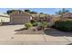 Charming single-story home with desert landscaping and a two-car garage at 5353 W Dublin Ct, Chandler, AZ 85226