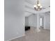 Open concept living room featuring tile flooring and a decorative column at 5353 W Dublin Ct, Chandler, AZ 85226