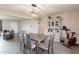 Dining area with an open concept, including a decorative cabinet and indoor cycling bike at 5607 N 23Rd Ave, Phoenix, AZ 85015