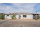 Charming single-story home with desert landscaping and solar panels for energy efficiency at 5607 N 23Rd Ave, Phoenix, AZ 85015