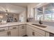 Stylish kitchen with quartz counters, stainless steel sink, and modern fixtures at 5607 N 23Rd Ave, Phoenix, AZ 85015