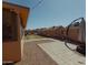 Backyard featuring a mix of stone, gravel, and grass, providing a versatile outdoor space at 6546 N 71St Ave, Glendale, AZ 85303