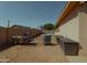 Cozy backyard area with outdoor seating and overhead string lights, perfect for relaxing evenings at 6546 N 71St Ave, Glendale, AZ 85303