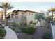 Beautifully landscaped community area with benches and shade trees at 6565 E Thomas Rd # 1128, Scottsdale, AZ 85251