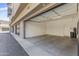 Spacious two-car garage with an open door, offering ample parking and storage space at 6565 E Thomas Rd # 1128, Scottsdale, AZ 85251