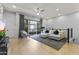 Bright living room with stylish decor, plush seating, and balcony access perfect for relaxing at 6565 E Thomas Rd # 1128, Scottsdale, AZ 85251