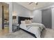 This main bedroom boasts soft carpet, ceiling fan, and an ensuite at 6565 E Thomas Rd # 1128, Scottsdale, AZ 85251