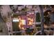 Aerial view showcasing the estate's layout, including the pool, landscaped grounds, and outdoor living spaces at twilight at 7501 N Eucalyptus Dr, Paradise Valley, AZ 85253