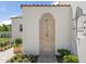 Stylish outdoor shower space with decorative tile accents and lush landscaping at 7501 N Eucalyptus Dr, Paradise Valley, AZ 85253