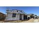 Exterior view of a home under construction, showcasing the framing and initial stages of development at 7604 W Saddlehorn Rd, Peoria, AZ 85383