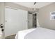 Bedroom view featuring closet, open guest room, and contemporary decor at 7810 W Beryl Ave, Peoria, AZ 85345