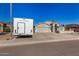 Charming single-Gathering home features a neutral color palette, RV parking, and well-manicured landscaping at 7810 W Beryl Ave, Peoria, AZ 85345