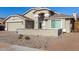 Charming single-Gathering home features a neutral color palette and well-manicured landscaping at 7810 W Beryl Ave, Peoria, AZ 85345