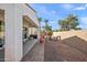 Cozy backyard patio with comfortable seating and lush landscaping at 7936 S 7Th Way, Phoenix, AZ 85042