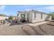 Backyard area with desert landscaping, patio, and hot tub at 7936 S 7Th Way, Phoenix, AZ 85042