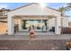 Outdoor patio area with cozy seating, grill and desert landscaping at 7936 S 7Th Way, Phoenix, AZ 85042