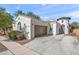 Charming single-Gathering home with a two-car garage, desert landscaping, and a welcoming front entrance at 7936 S 7Th Way, Phoenix, AZ 85042
