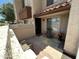 Charming front porch with seating area and vibrant rug, perfect for enjoying the outdoors at 839 S Westwood S -- # 169, Mesa, AZ 85210