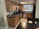 Functional kitchen offering ample cabinet space and modern appliances with tiled floor at 839 S Westwood S -- # 169, Mesa, AZ 85210