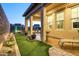 Charming backyard with lush synthetic lawn, perfect for outdoor enjoyment and relaxation at 8691 E Eastwood Cir, Carefree, AZ 85377