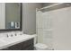 Modern bathroom featuring a shower with glass door, vanity, and neutral tones at 8691 E Eastwood Cir, Carefree, AZ 85377