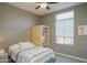 Neutral bedroom featuring a comfortable bed, an infrared sauna, and a bright window at 8691 E Eastwood Cir, Carefree, AZ 85377