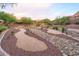 Community space with sand and rock landscape and various desert vegetation at 8691 E Eastwood Cir, Carefree, AZ 85377