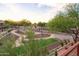 Spacious community area featuring walking paths and landscaping with various vegetation and court at 8691 E Eastwood Cir, Carefree, AZ 85377