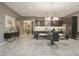 Open-concept dining area connected to a modern kitchen, perfect for entertaining guests at 8691 E Eastwood Cir, Carefree, AZ 85377