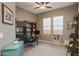 Spacious office featuring dark shelving, an office desk, and a ' corner at 8691 E Eastwood Cir, Carefree, AZ 85377