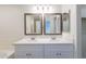Bathroom featuring double sinks, vanity, and modern fixtures at 8854 W Aster Dr, Peoria, AZ 85381