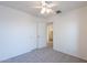 Cozy bedroom features a closet and neutral carpet flooring at 8854 W Aster Dr, Peoria, AZ 85381