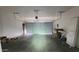 Spacious two car garage with ample storage and plenty of room for parking at 8854 W Aster Dr, Peoria, AZ 85381
