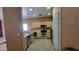 Functional kitchen features wood cabinets, stainless steel appliances, and tile flooring at 8854 W Aster Dr, Peoria, AZ 85381