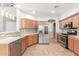 Well-equipped kitchen with stainless steel appliances, ample counter space, and decorative backsplash at 10351 W Carlota Ln, Peoria, AZ 85383
