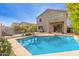 Inviting backyard pool with patio, lush landscaping, and a charming playhouse; perfect for outdoor relaxation and Gathering fun at 10351 W Carlota Ln, Peoria, AZ 85383