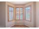 Cozy bay window with wood shutters providing natural light at 10517 W La Reata Ave, Avondale, AZ 85392