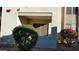 Exterior view of a condo with desert landscaping and a shaded patio at 10610 S 48Th St # 1074, Phoenix, AZ 85044