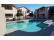 Community swimming pool with adjacent jacuzzi are fenced in, promoting resident safety at 10610 S 48Th St # 1074, Phoenix, AZ 85044